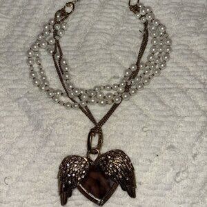 Slightly used Betsey Johnson Floral Satchel and Fly With Me Heart necklace